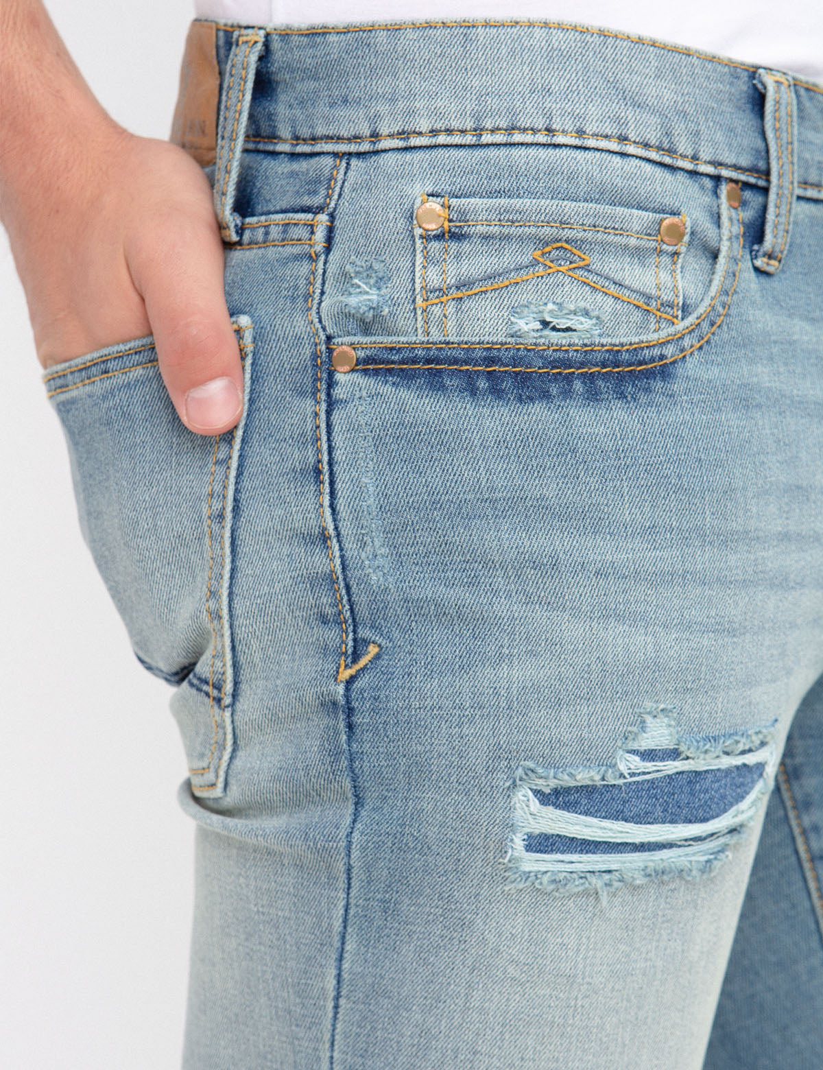 REPREVE® Eco-Friendly Skinny Distressed Jeans with Patch Repair